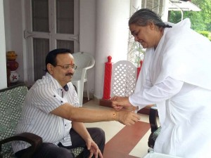 B.K. Shailja Tying Rakhi to District Judge Bharat Bhushan Shrivastava